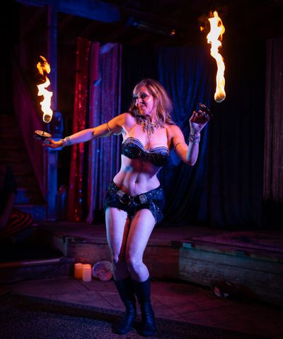 Jessica Cooper performing with fire